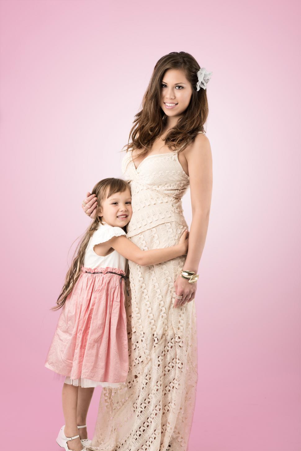 Free Image of Daugher hugs mom 