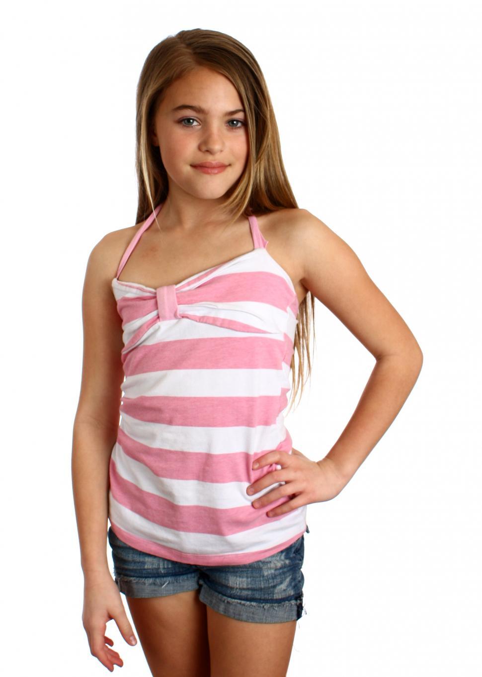 Free Image of A beautiful young girl posing on a white background 