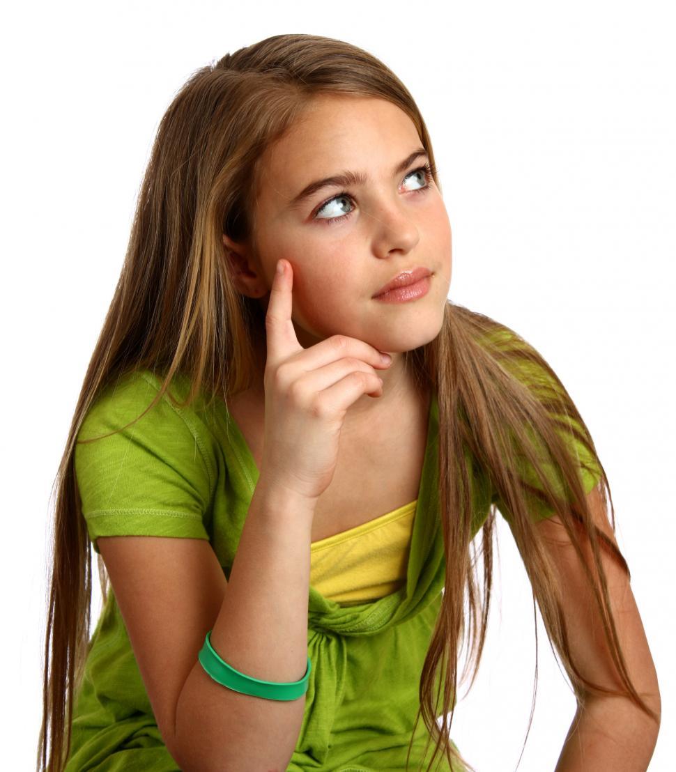 Free Image of A beautiful young girl with a thoughtful expression 