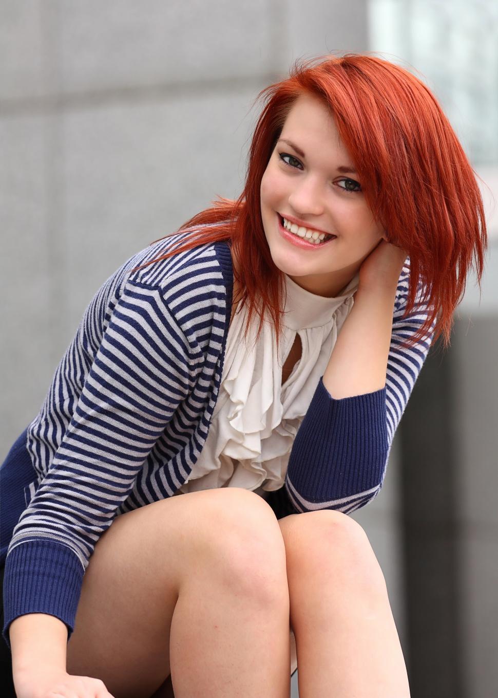 Free Image of A beautiful young woman in business attire 