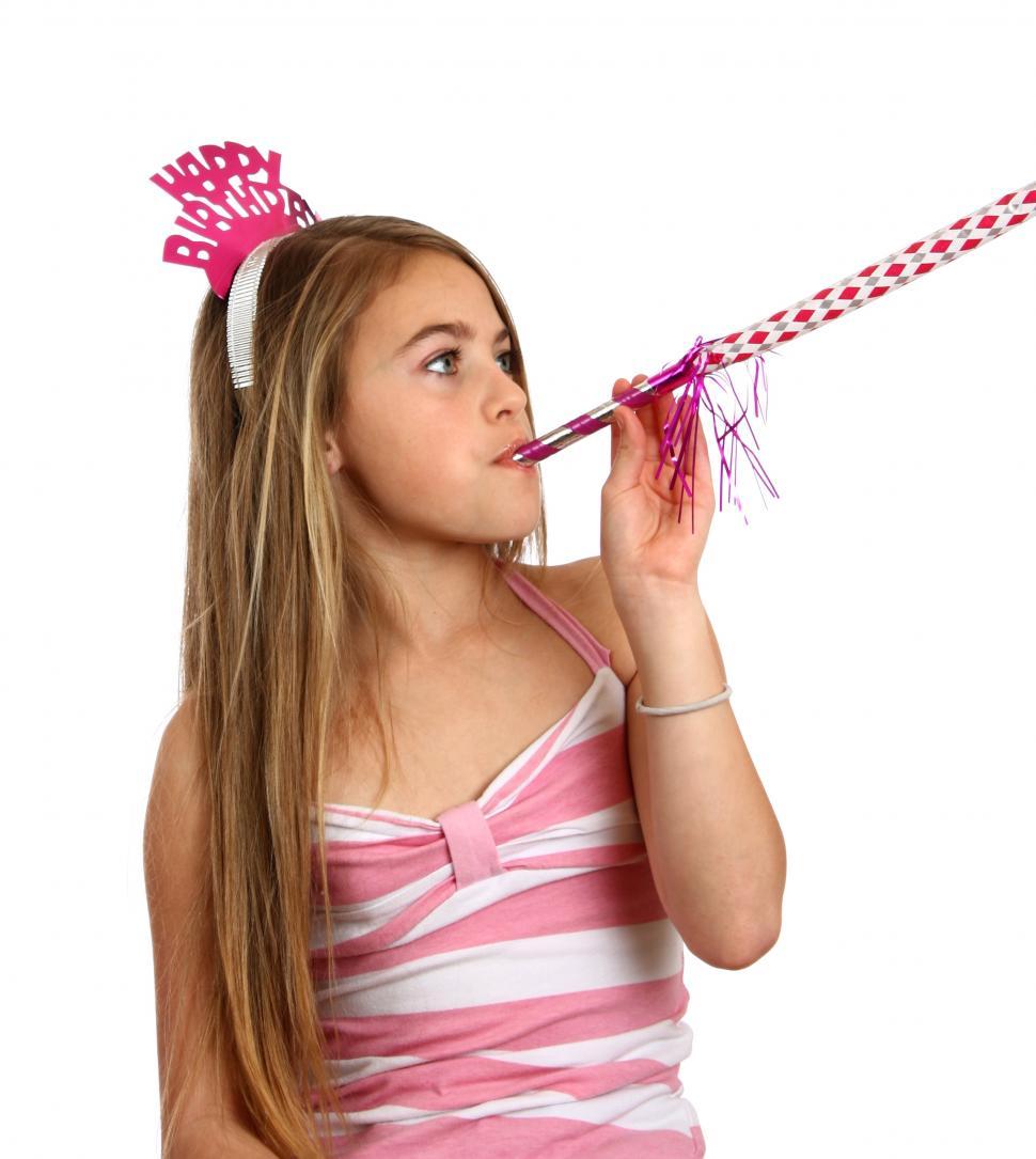 Free Image of A beautiful young girl celebrating a birthday 