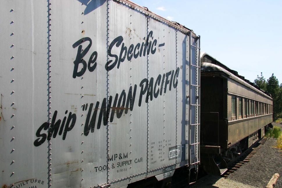 Free Image of Train Car Sitting on Tracks 