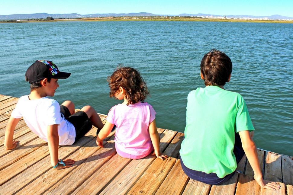 Free Image of Kids socializing on the pier 