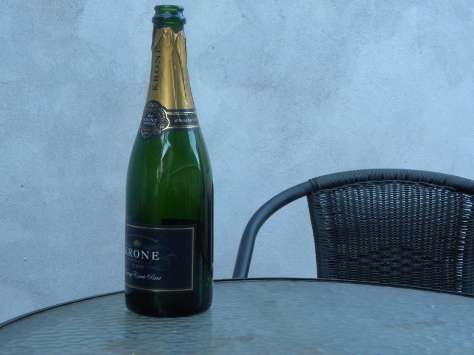 Free Image of Bottle of Sparkling wine on a table 