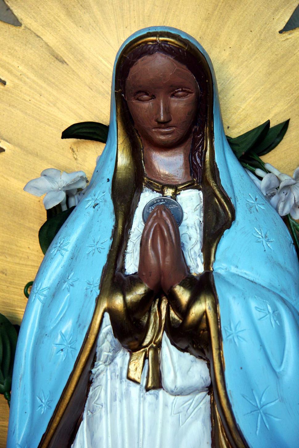 Free Image of Statue of a Woman in a Blue Robe 