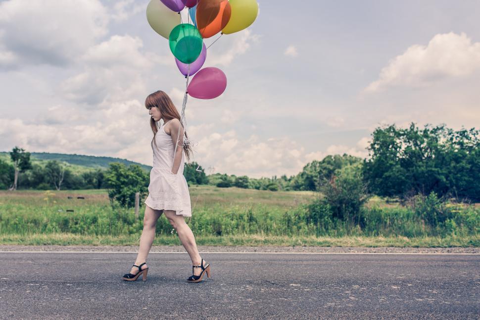 Free Image of Girl with balloons 