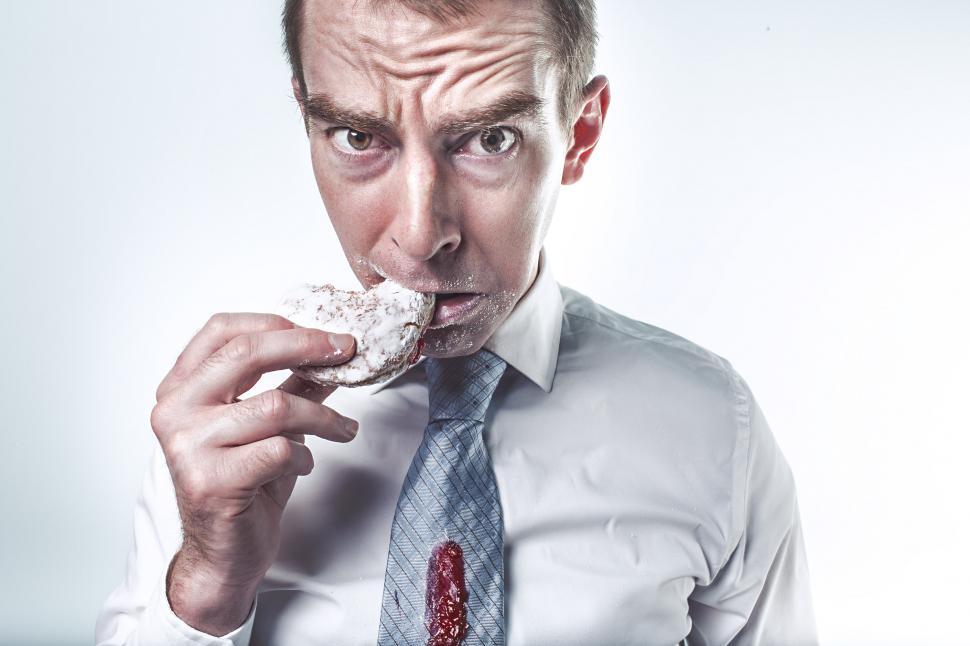 Free Image of Businessman with doughnut 