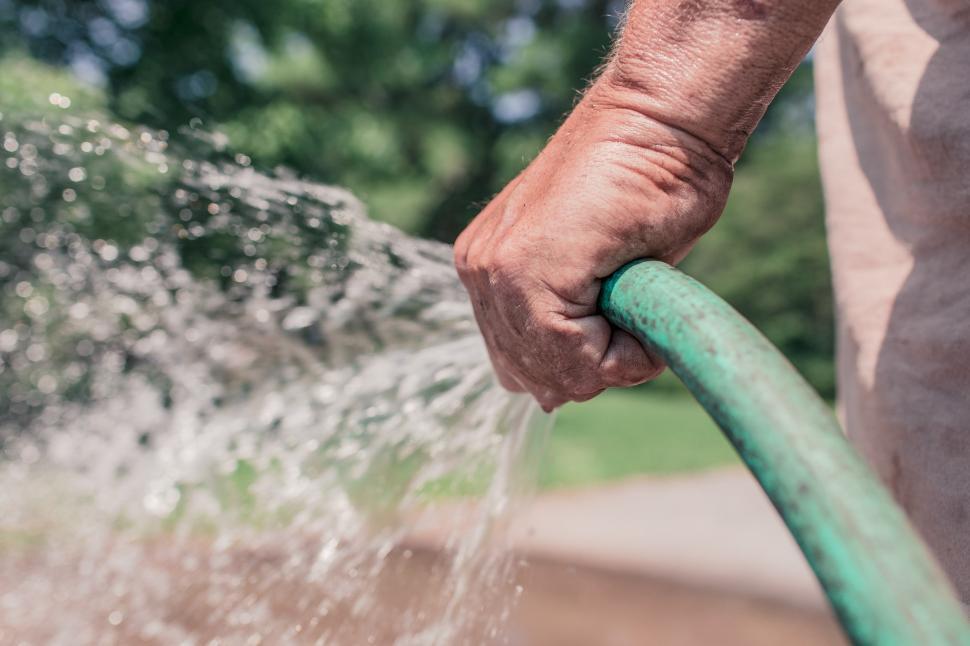 Free Image of Spraying the hose 