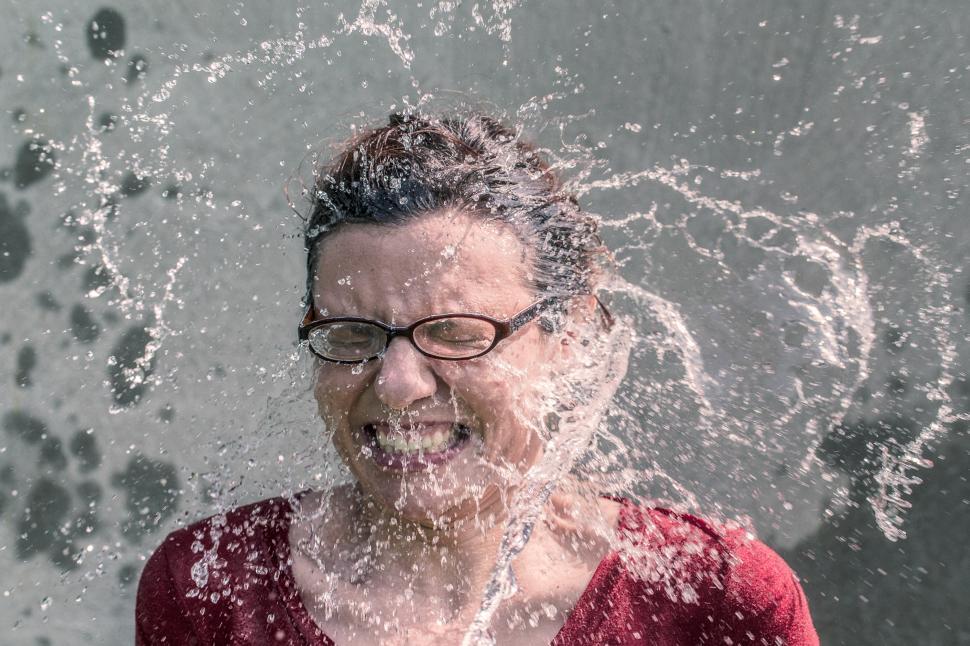 Free Image of Woman splashed with water 