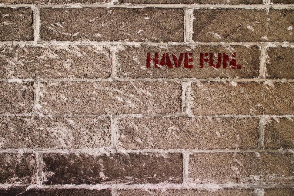 Free Image of Brick Wall says Have Fun 