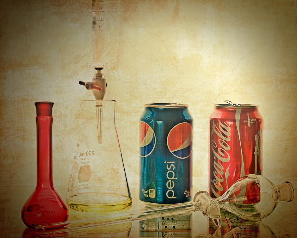 Free Image of Lab glass and soda cans 
