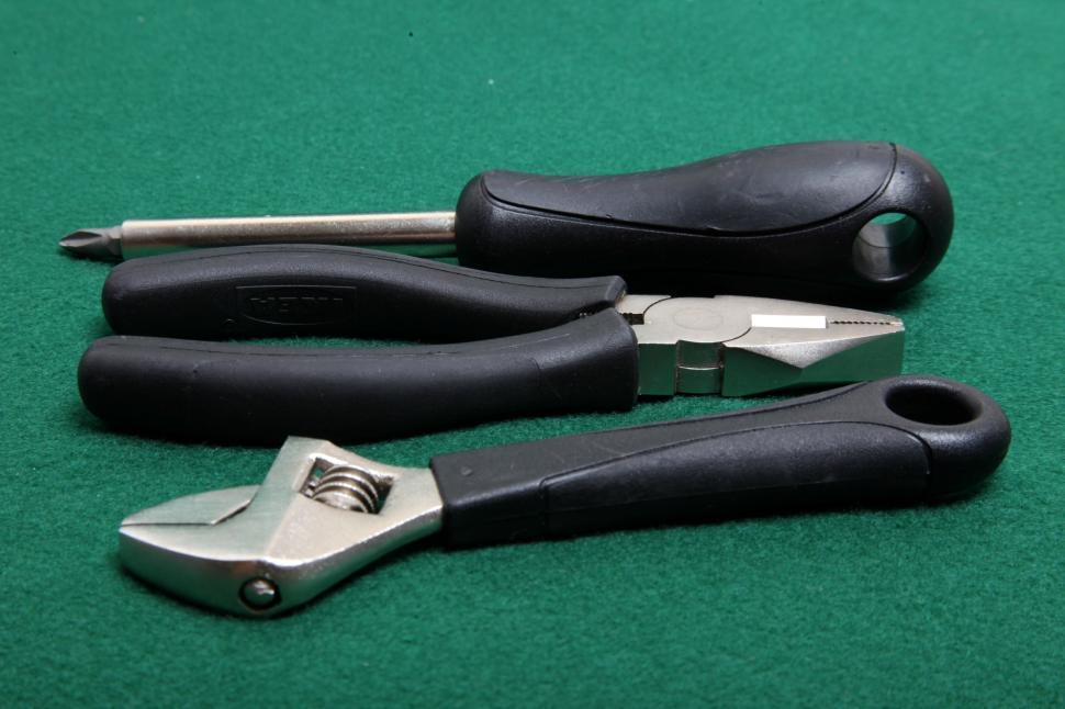Free Image of Screwdriver with wrench and pliers. 
