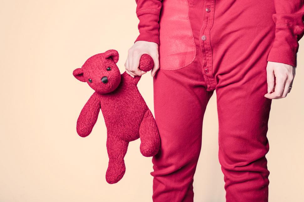 Free Image of Woman in Pink with Pink Teddy Bear 