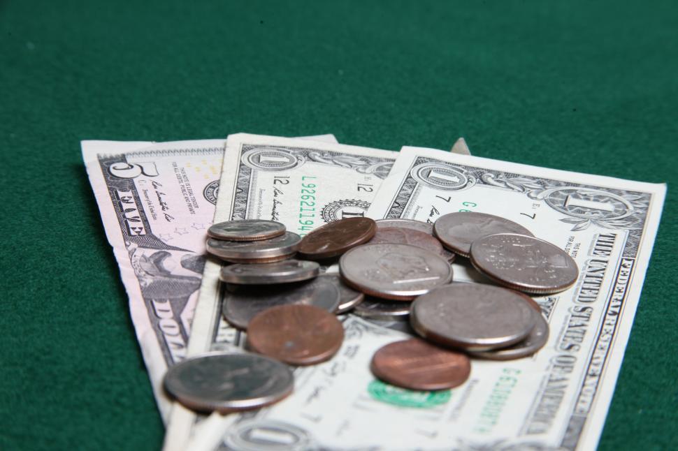 Free Image of Coins and dollar bills 