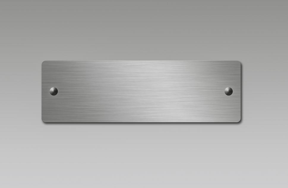 Free Image of Metal Plaque on Gray Background 