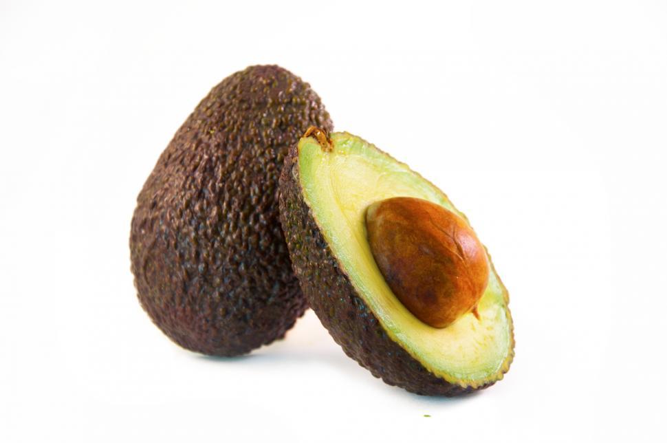 Free Image of Halved Avocado on White Background 