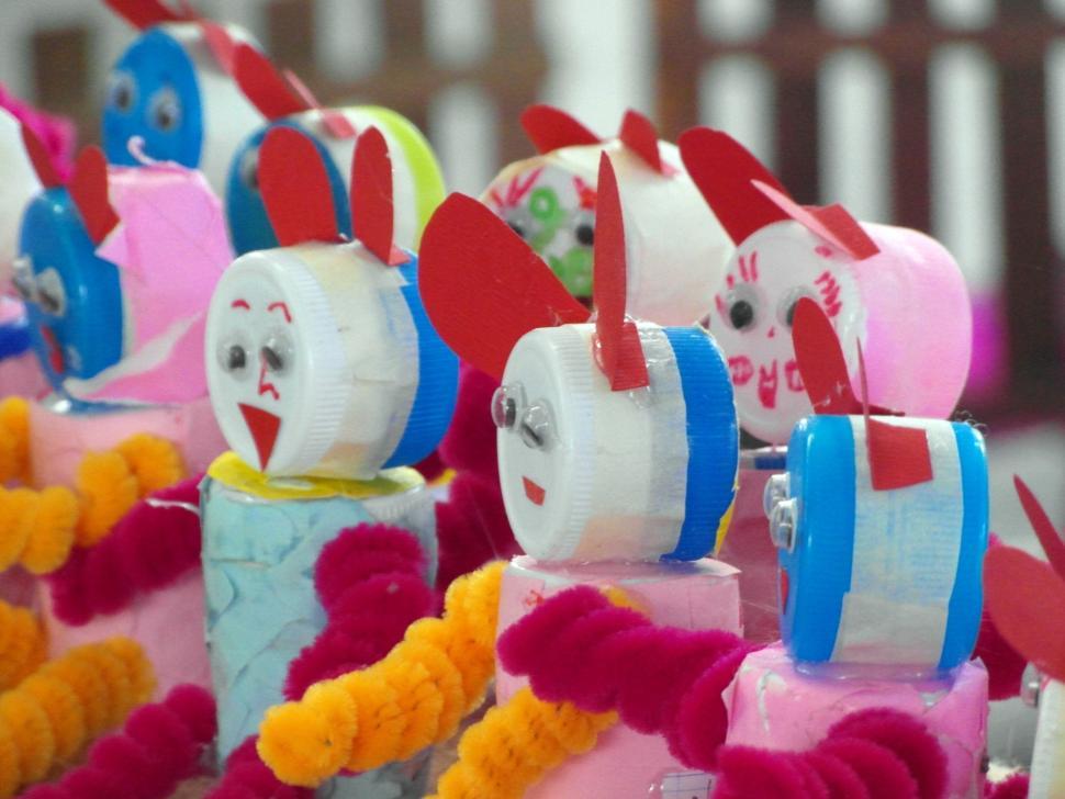 Free Image of Recycled Bottle Tops Craft Dolls 