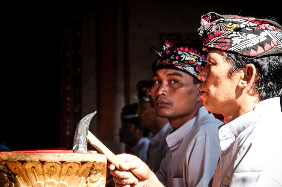 Free Image of Men play traditional gamelan percussion  