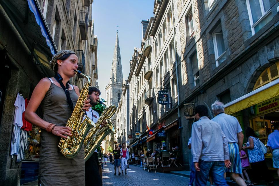 Free Image of street musician playing saxophone 