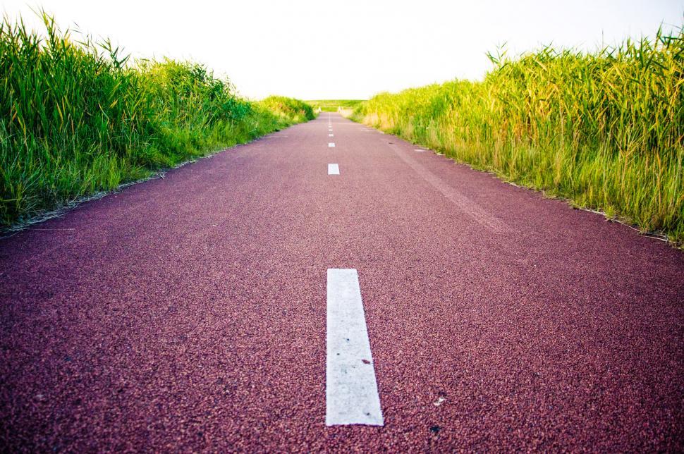 Free Image of Red road and green grass 