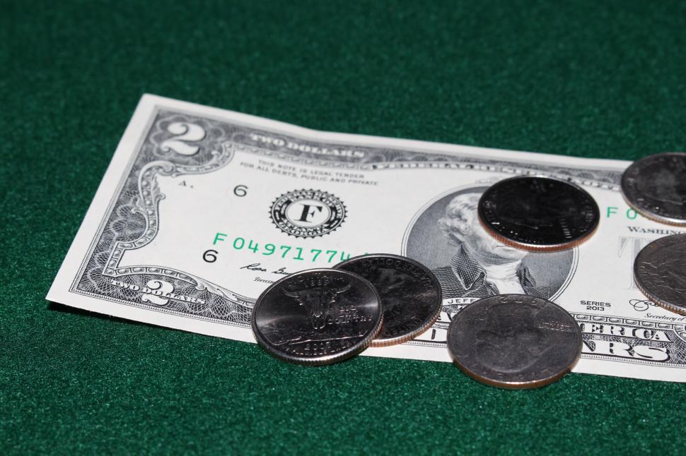 Free Image of Coins and Dollar Bill 