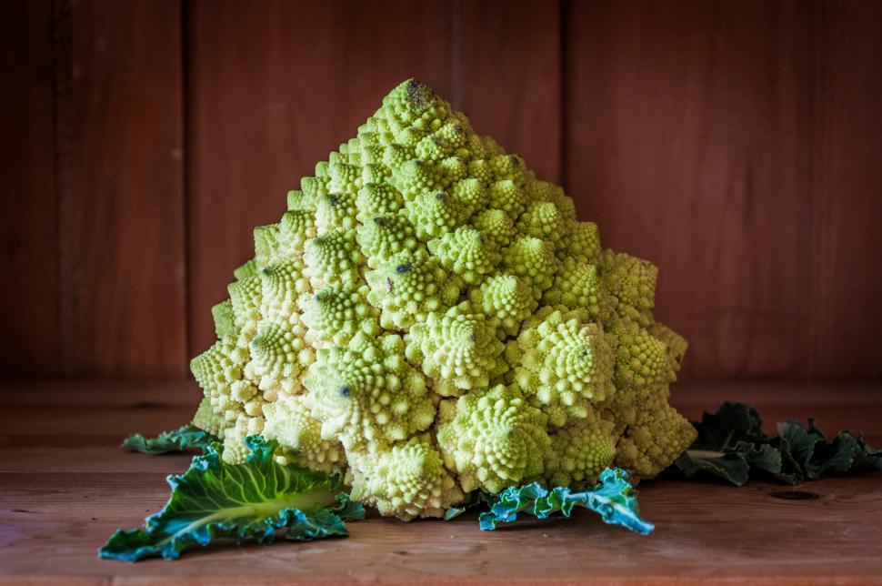 Free Image of Romanesco broccoli on wooden background 