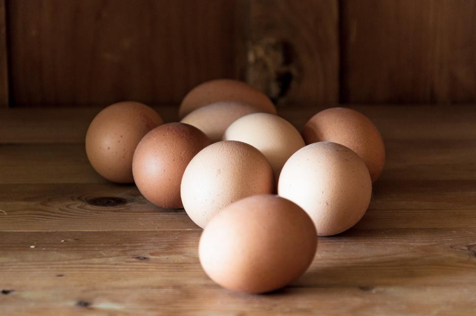 Free Image of Eggs on wood background 