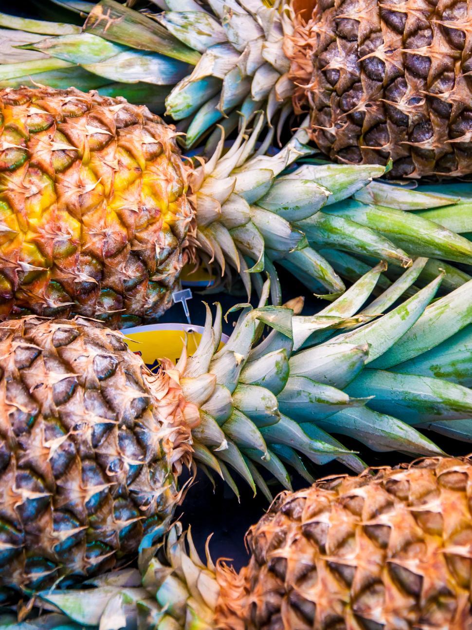 Free Image of A lot of pineapple fruit background 