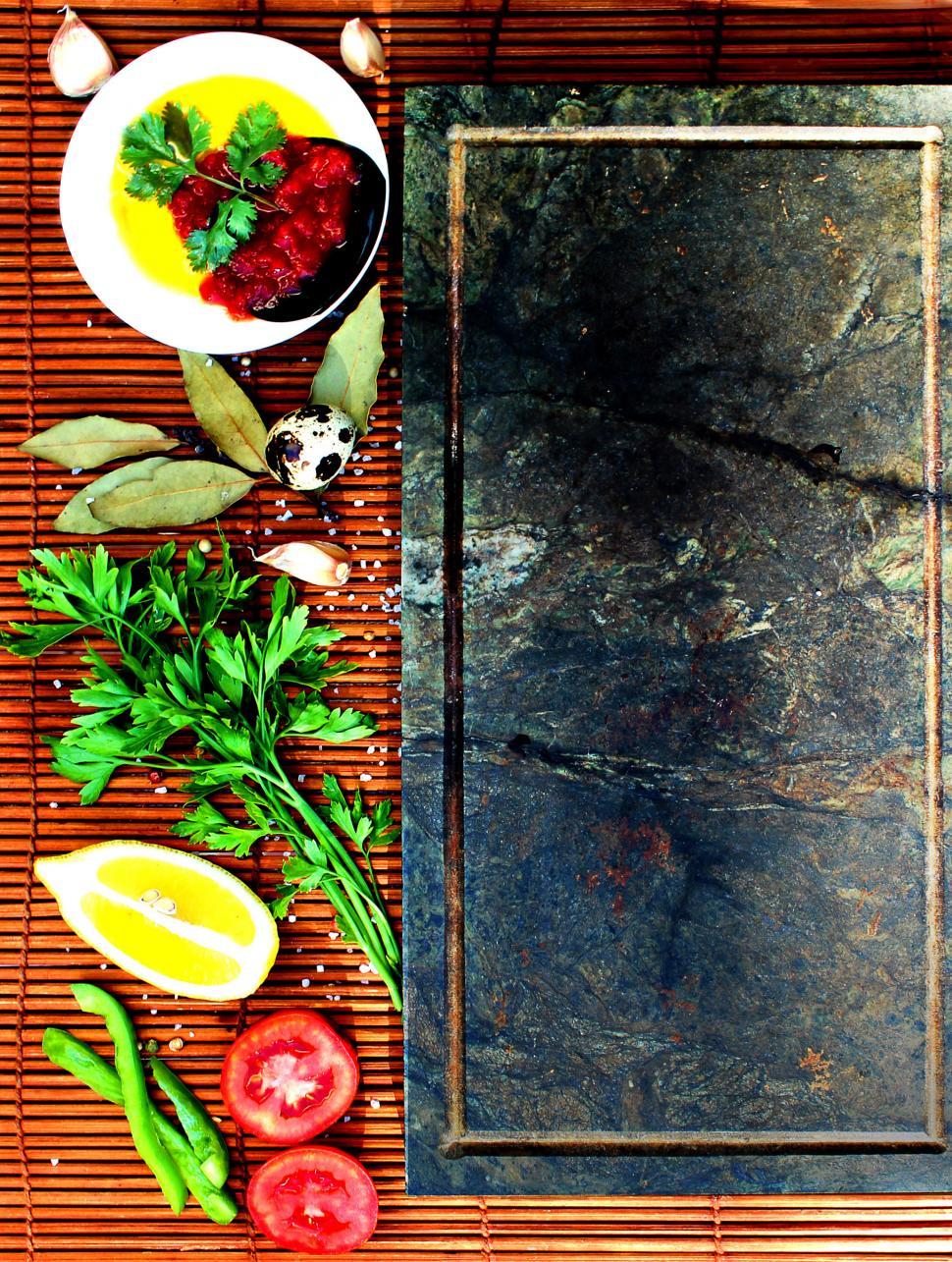 Free Image of Basic mediterranean style cooking ingredients on straw 