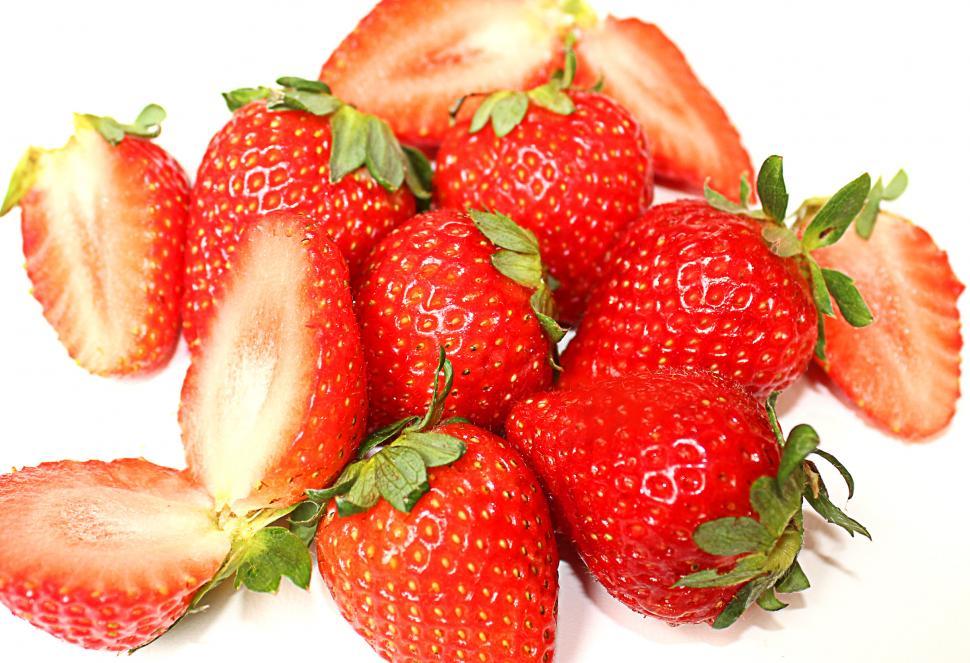 Free Image of Close-up of red sweet strawberry fruits isolated on white backgr 