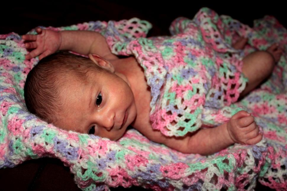 Free Image of Baby waking up 