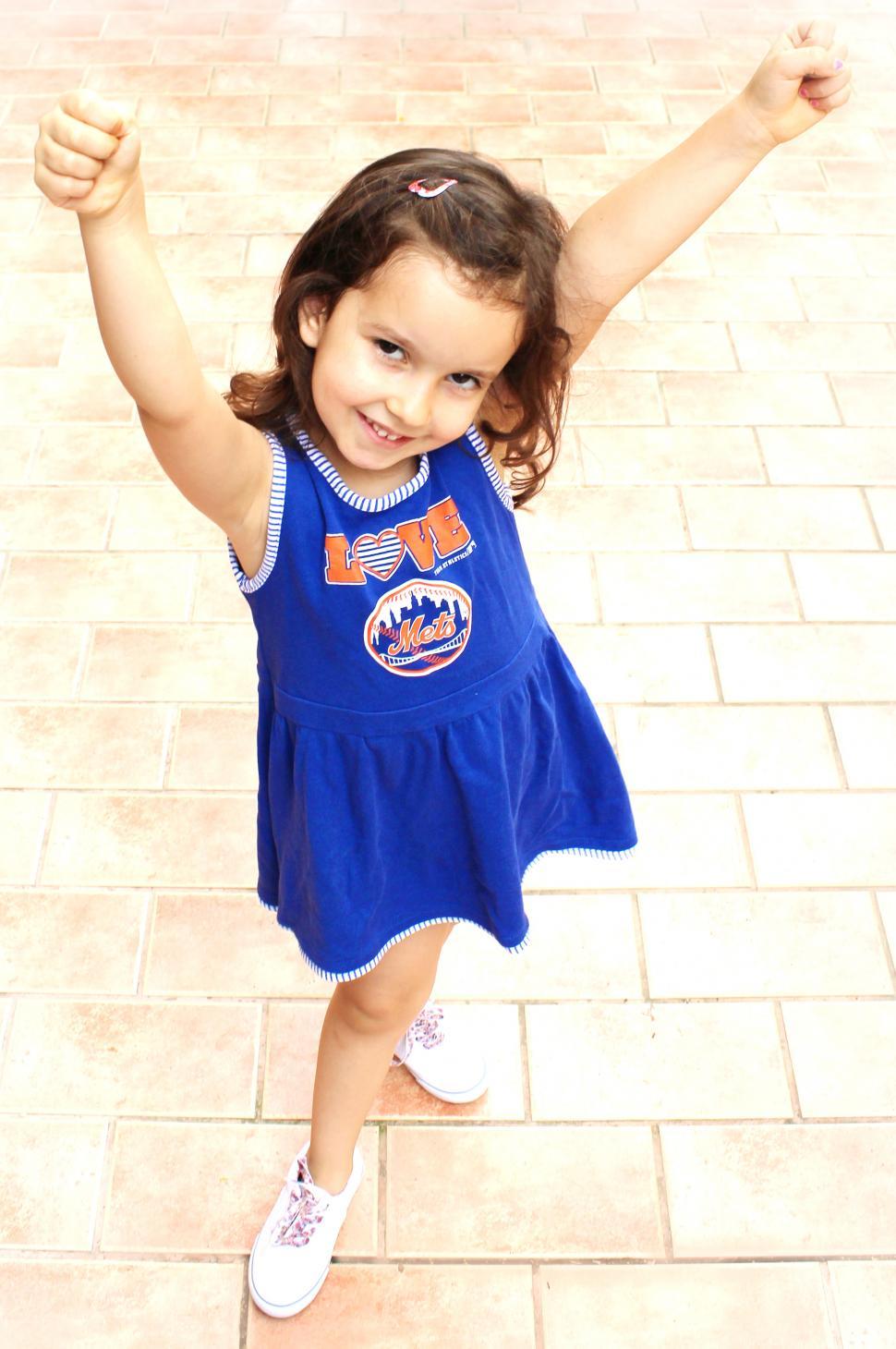 Free Image of Girl cheers wearing a blue dress - Mets fan 