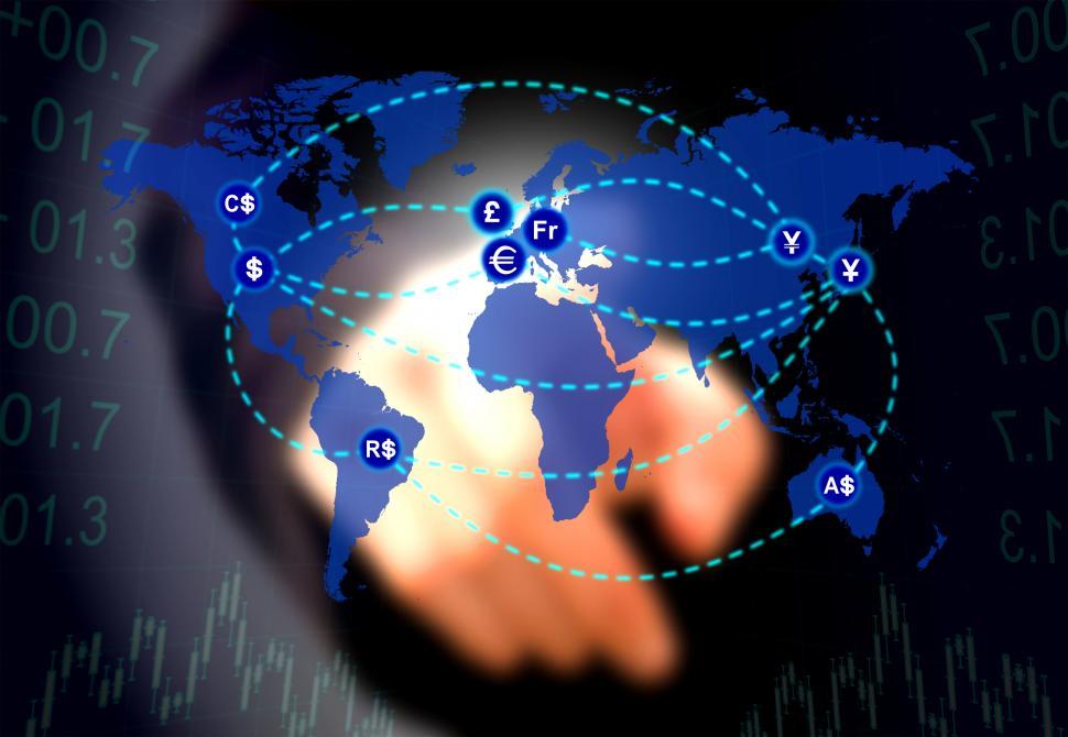 Free Image of Forex trader touching a virtual currency map 