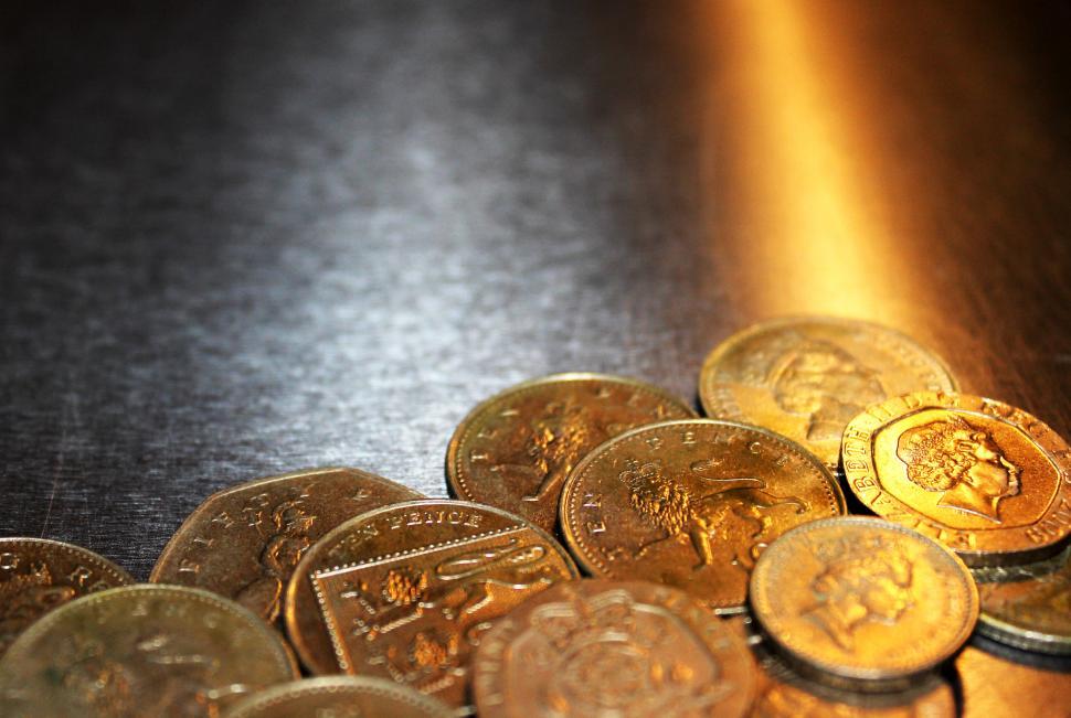 Free Image of British pound coins on metal background 