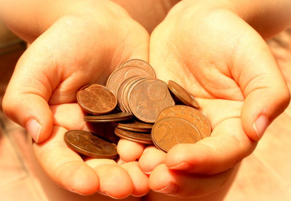 Free Image of Hands showing euro coins 