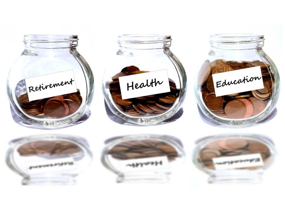 Free Image of Retirement and health and education Concept - Coins in the jar  