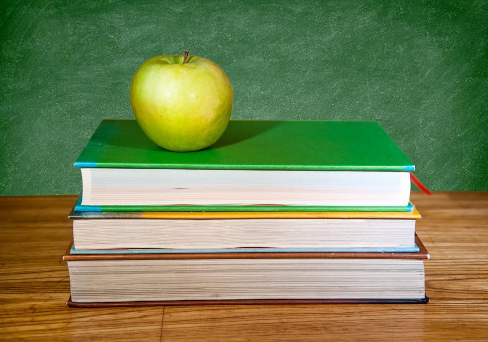 Free Image of back to school books, apple and chalkboard 