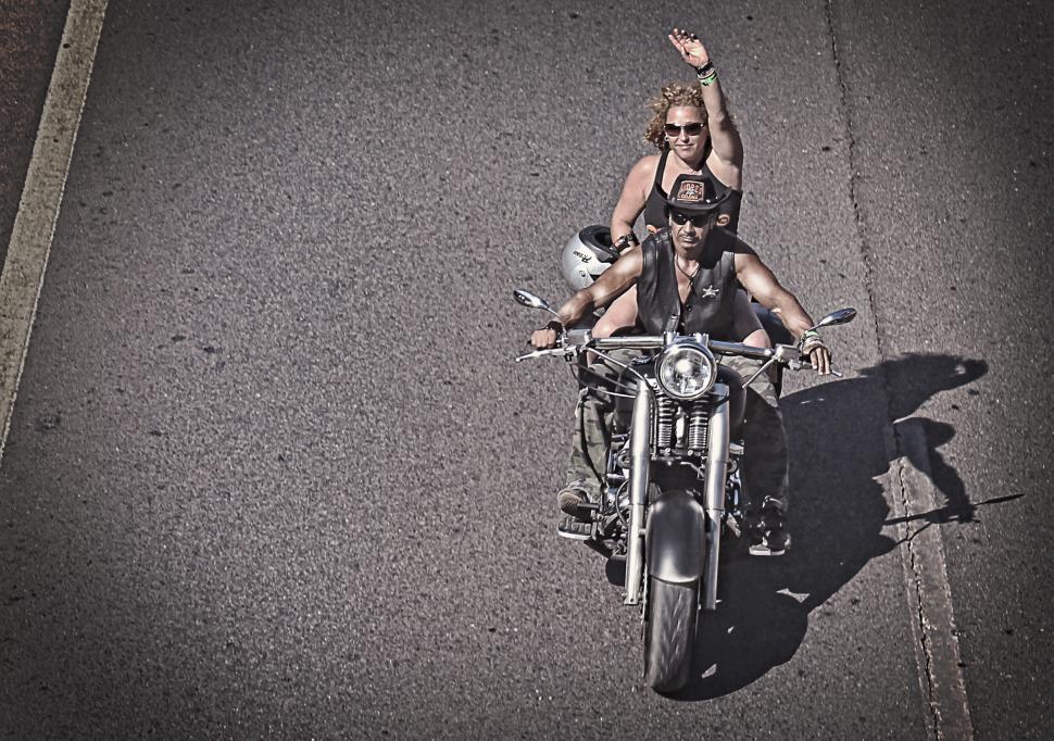 Free Image of Biker waving on a Harley Davidson - Grunge look 