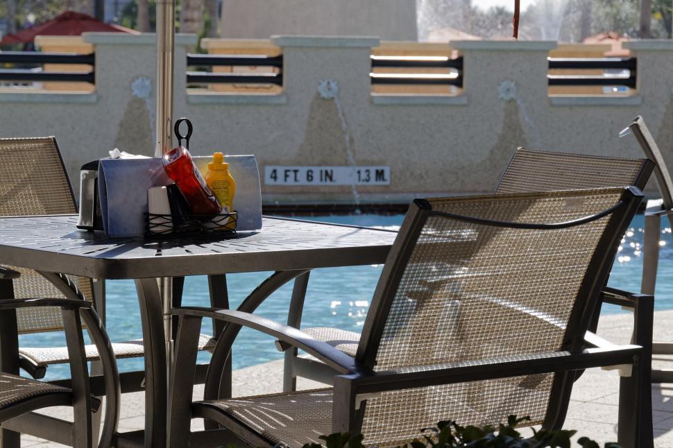 Free Image of Table Setting and Swimming Pool  