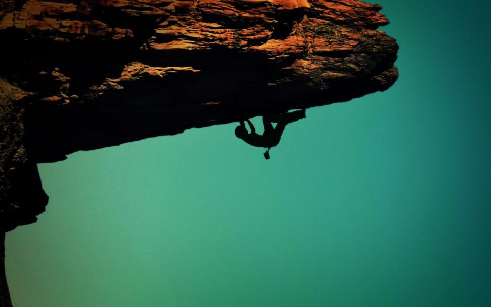 Free Image of Silhouette of a rock-climber 
