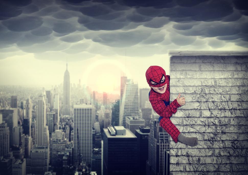 Free Image of Young boy dreams of being a superhero - Child imagination and cre 
