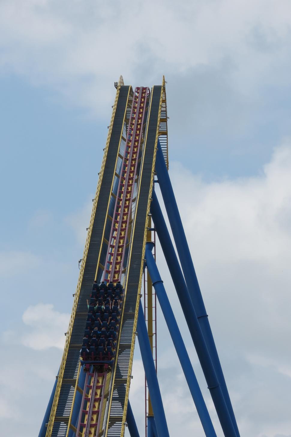 Free Image of Riders on a roller coaster   