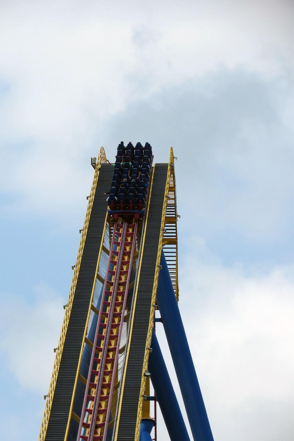Free Image of Riders on a roller coaster 