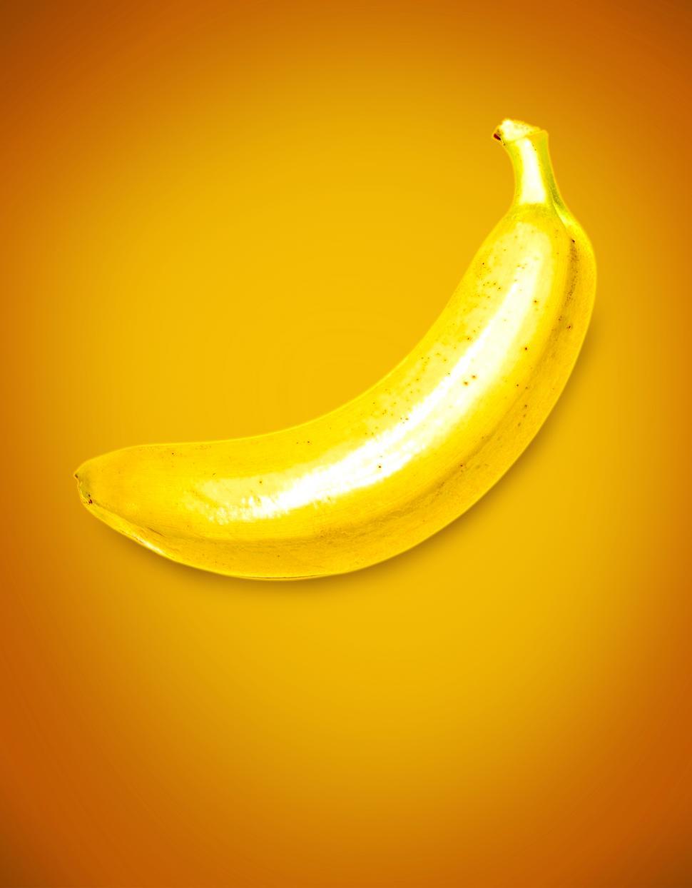Free Image of Yellow Banana on Yellow Background 