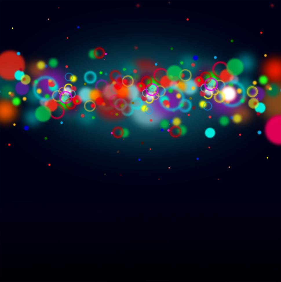 Free Image of Colorful bokeh on dark blue background with copyspace 