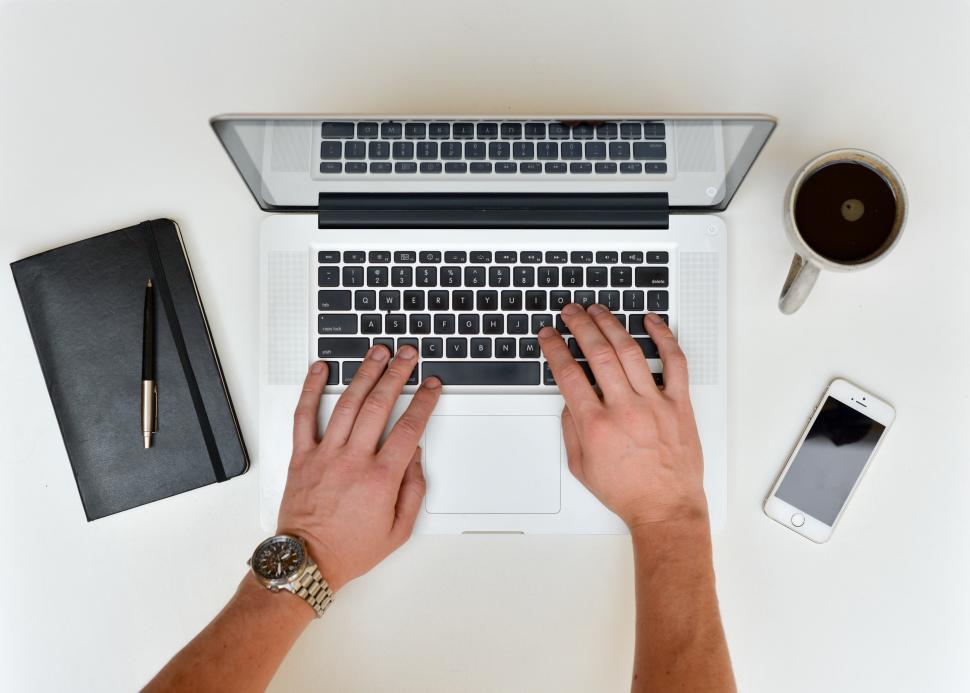 Free Image of Hands typing on laptop 