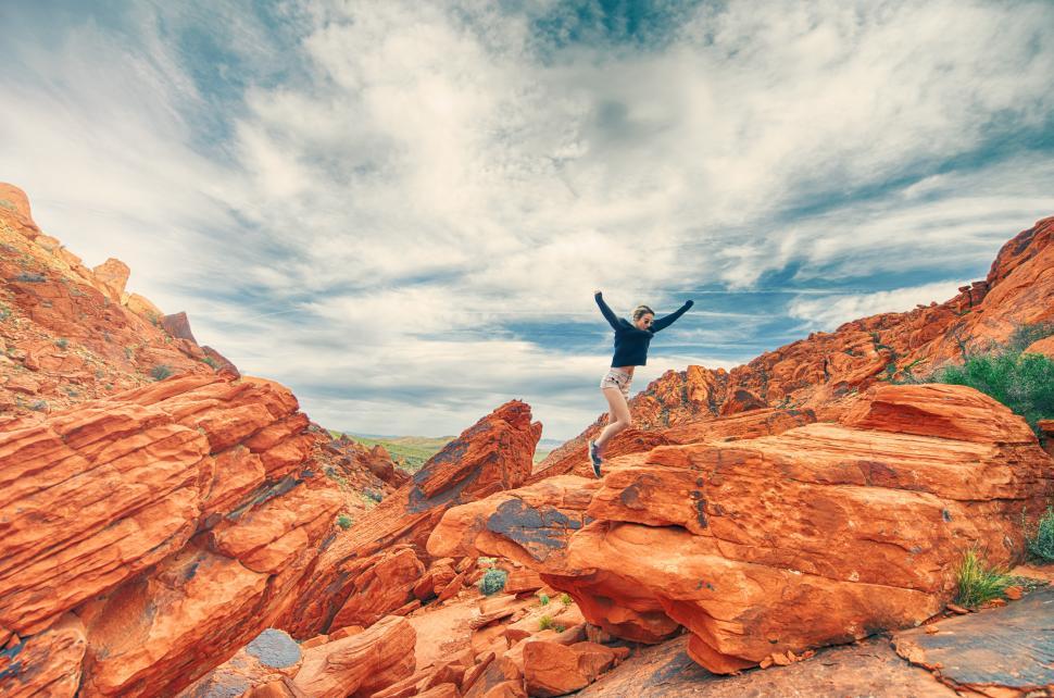 Free Image of Woman hiking in canyons 