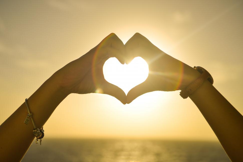 Free Image of Hands make a heart 