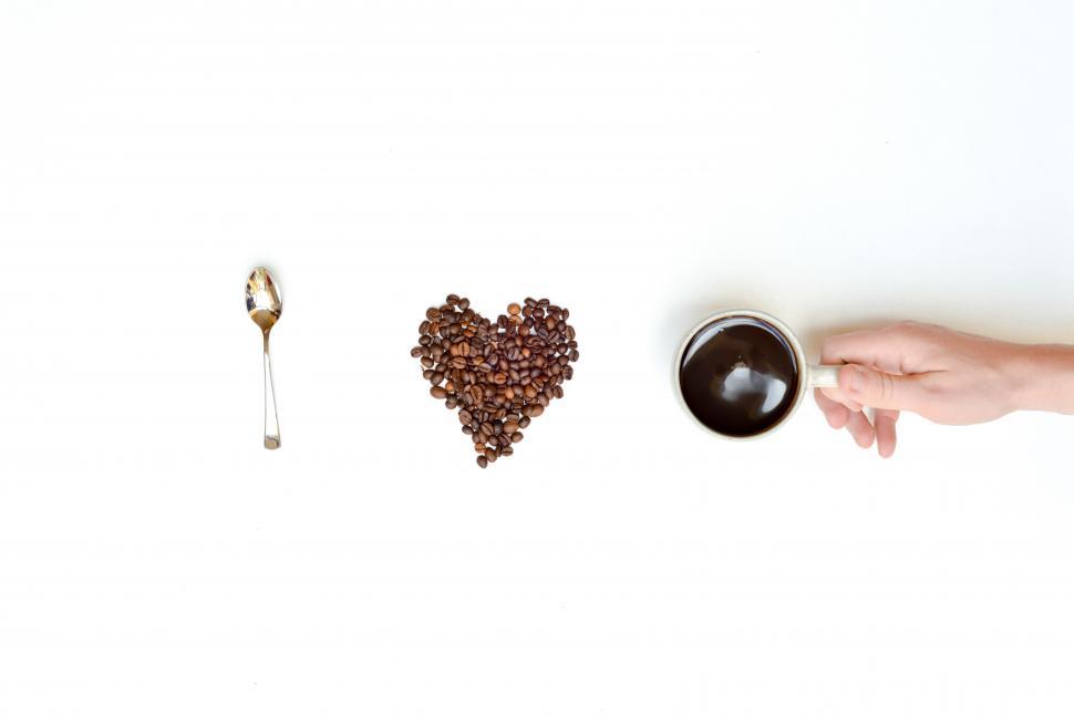 Free Image of Heart shape, coffee beans and a cup 