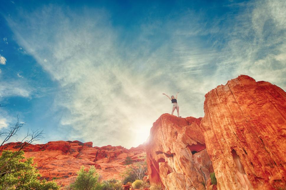 Free Image of Woman on top of cliff 